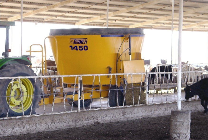 Tormex 1450 vertical feed mixer on a white background