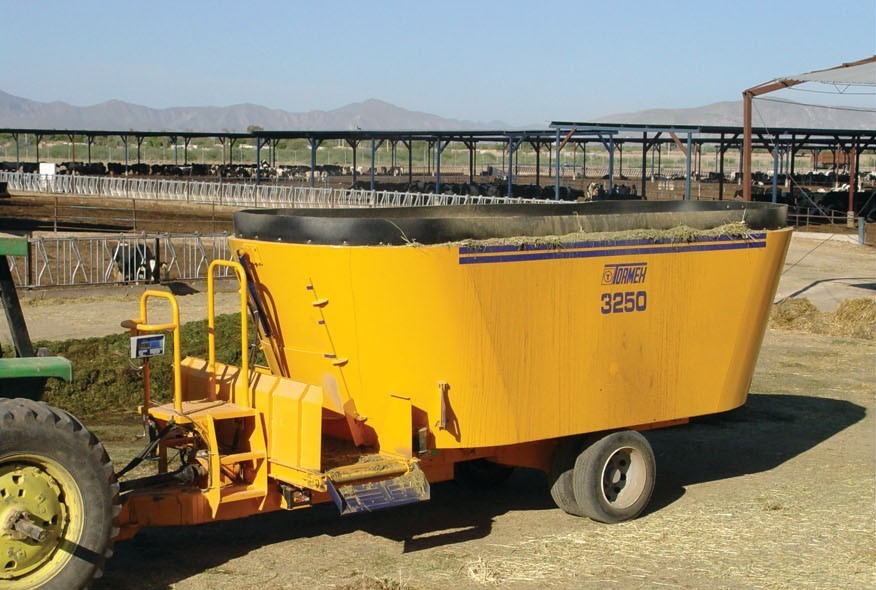 Tormex 3250 vertical feed mixer on a white background